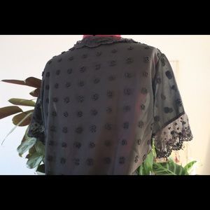 Sheer top with stitched pattern